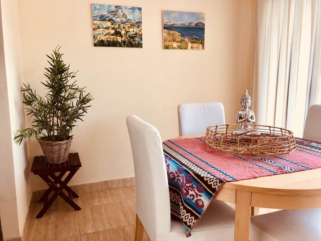 Appartamento con 2 camere da letto e balcone esposto a sud