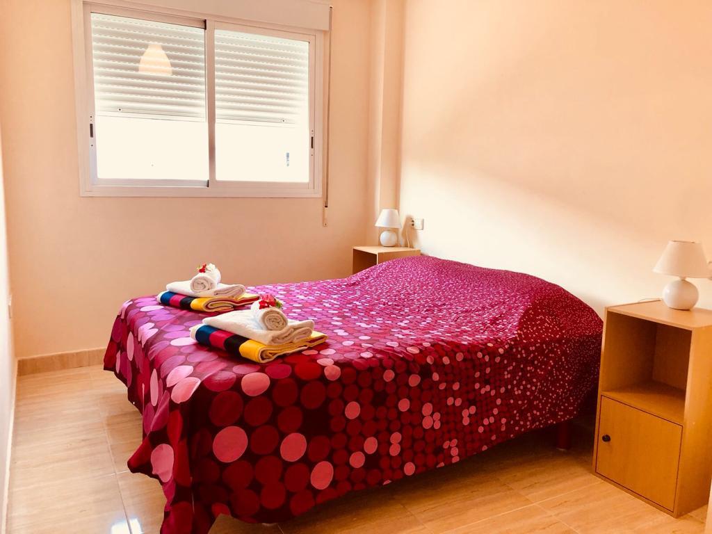 Appartamento con 2 camere da letto e balcone esposto a sud