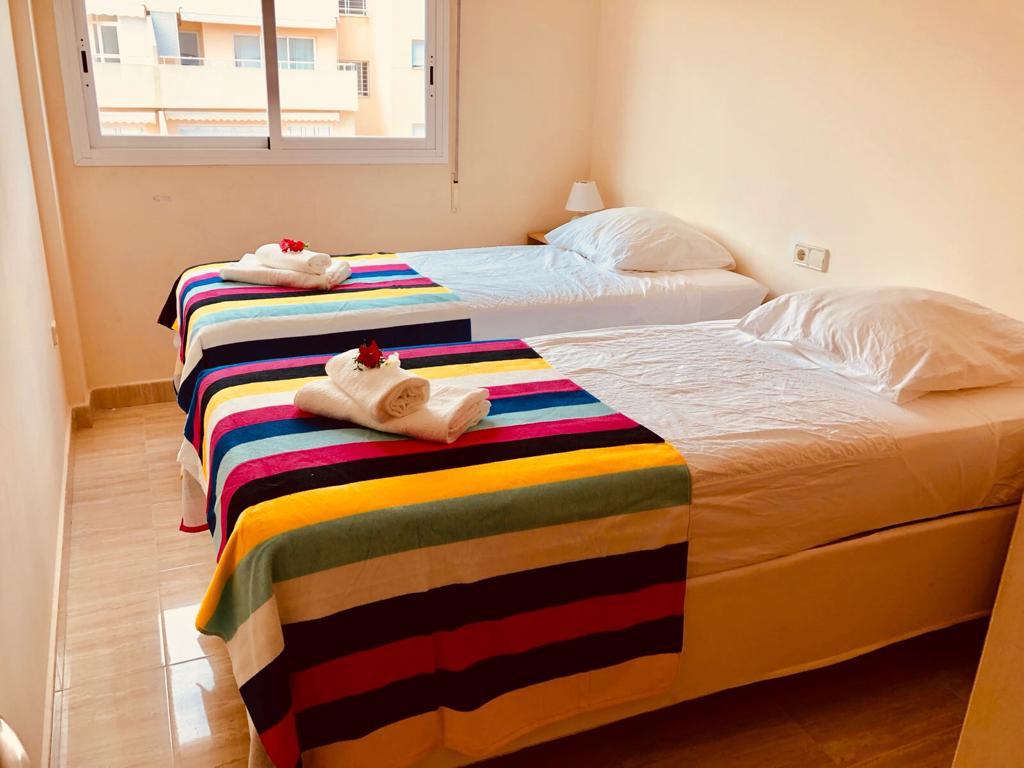 Appartamento con 2 camere da letto e balcone esposto a sud