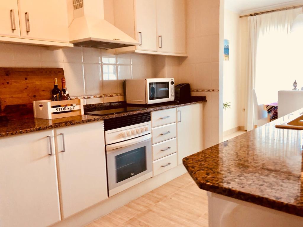 Appartamento con 2 camere da letto e balcone esposto a sud