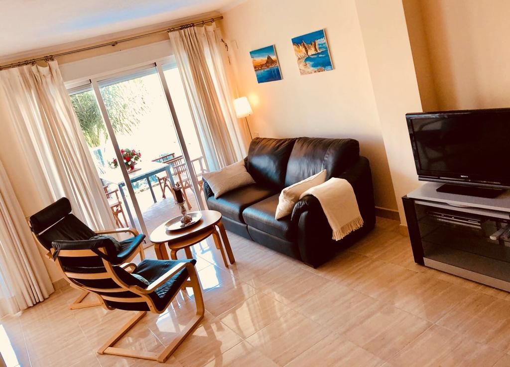 Appartamento con 2 camere da letto e balcone esposto a sud